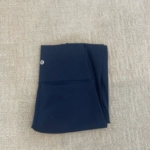 Navy Lululemon leggings (I think wunder train)